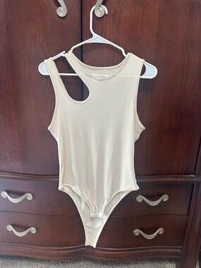 Cream One-Piece Bodysuit with Asymmetric Strap